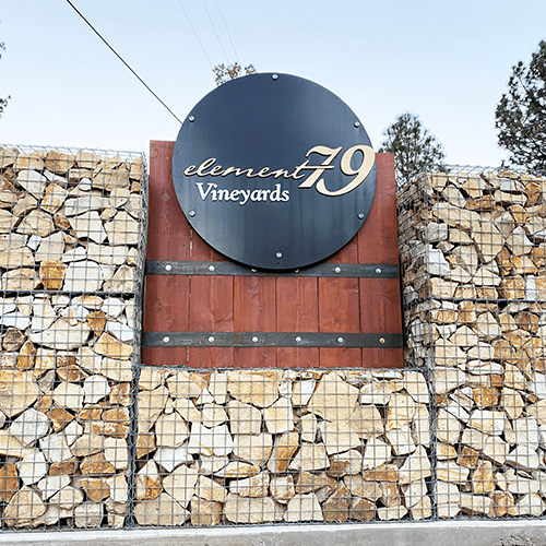 Element 79 entrance stone sign with logo.
