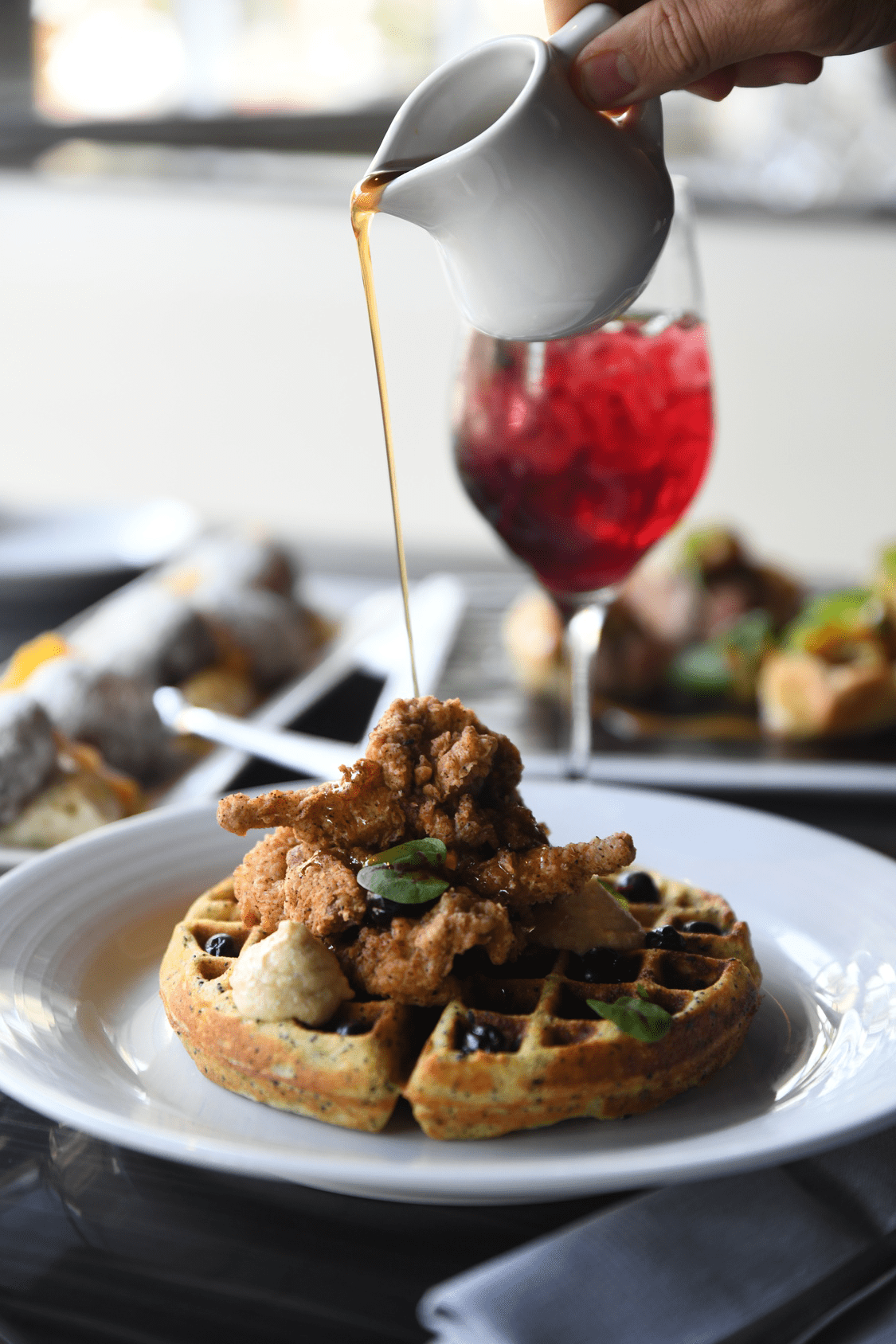 chicken and waffles syrup with wine and fresh fruit